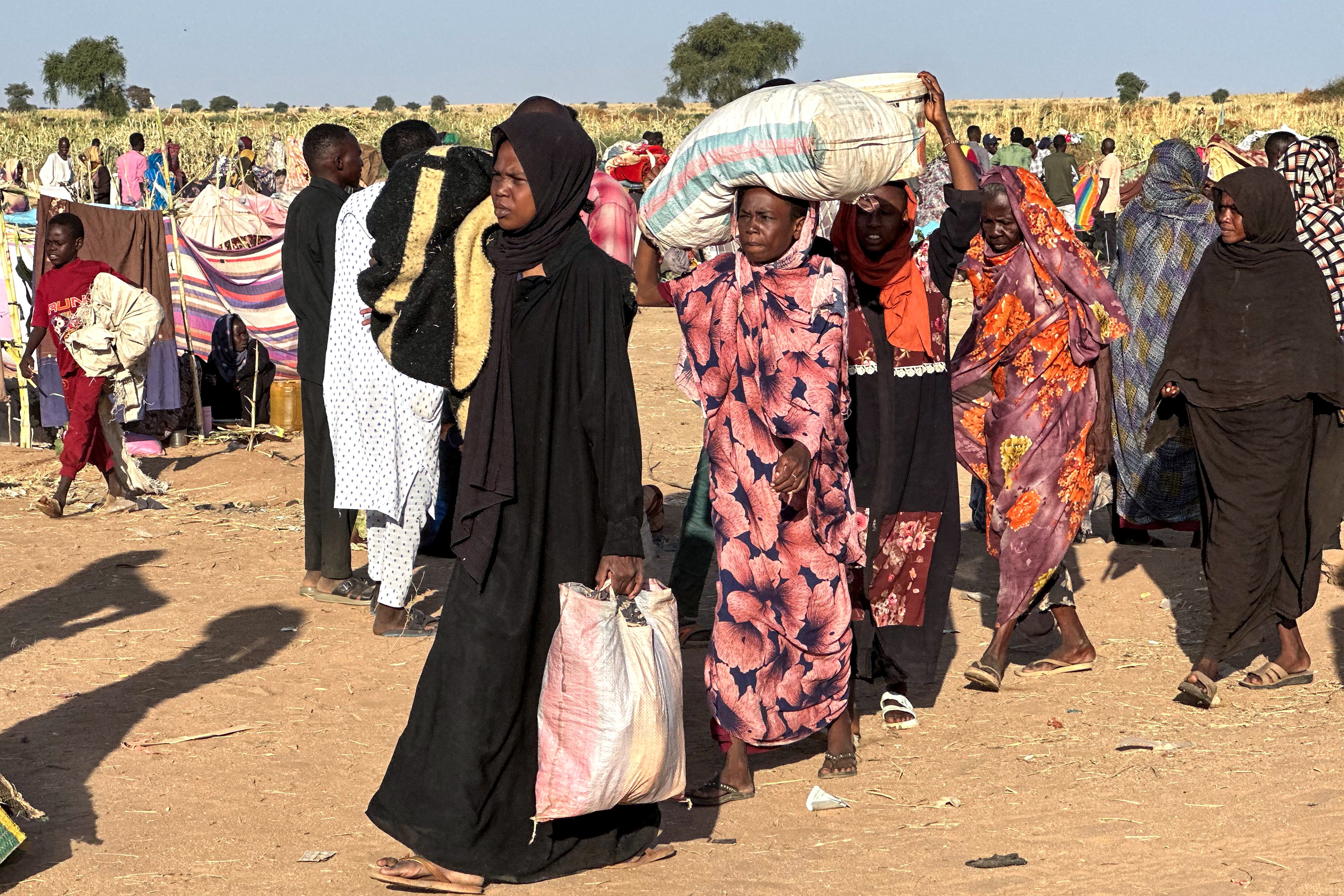 Displaced Sudanese who fled el-Fasher after the city fell to the Rapid Support Forces (RSF), arrive in the town of Tawila war-torn Sudan
